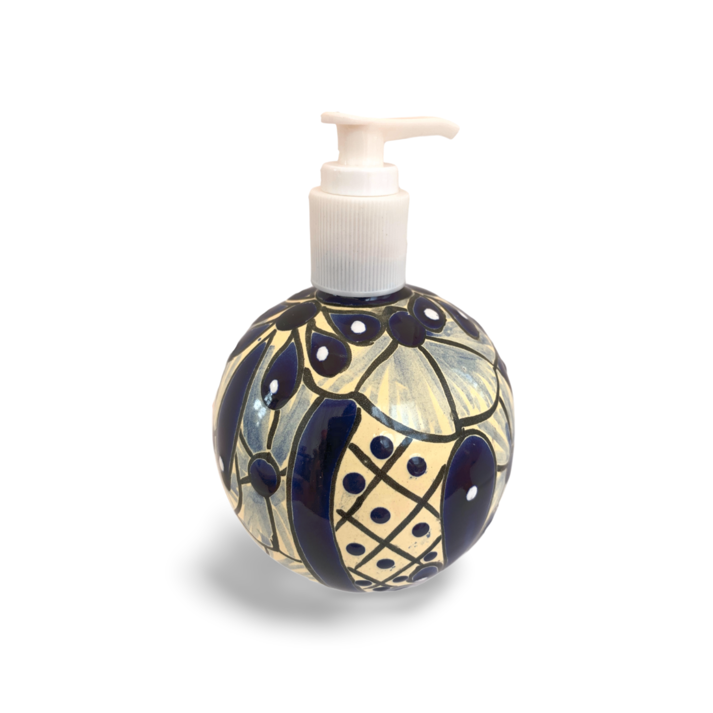A spherical soap dispenser, hand-painted in blue and white Talavera design, adding a vibrant touch to any kitchen or bathroom.