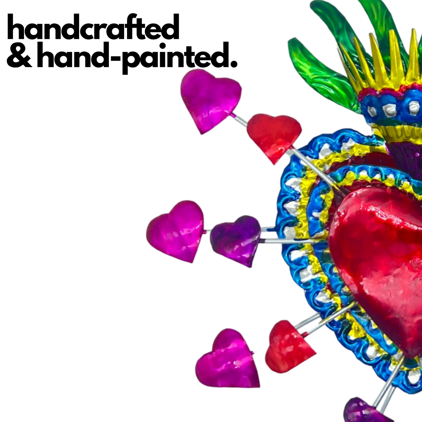 Colorful, hand-painted Embossed Tin Heart Milagro, a symbol of love and luck, easy to hang as vibrant Mexican Folk Art decor.