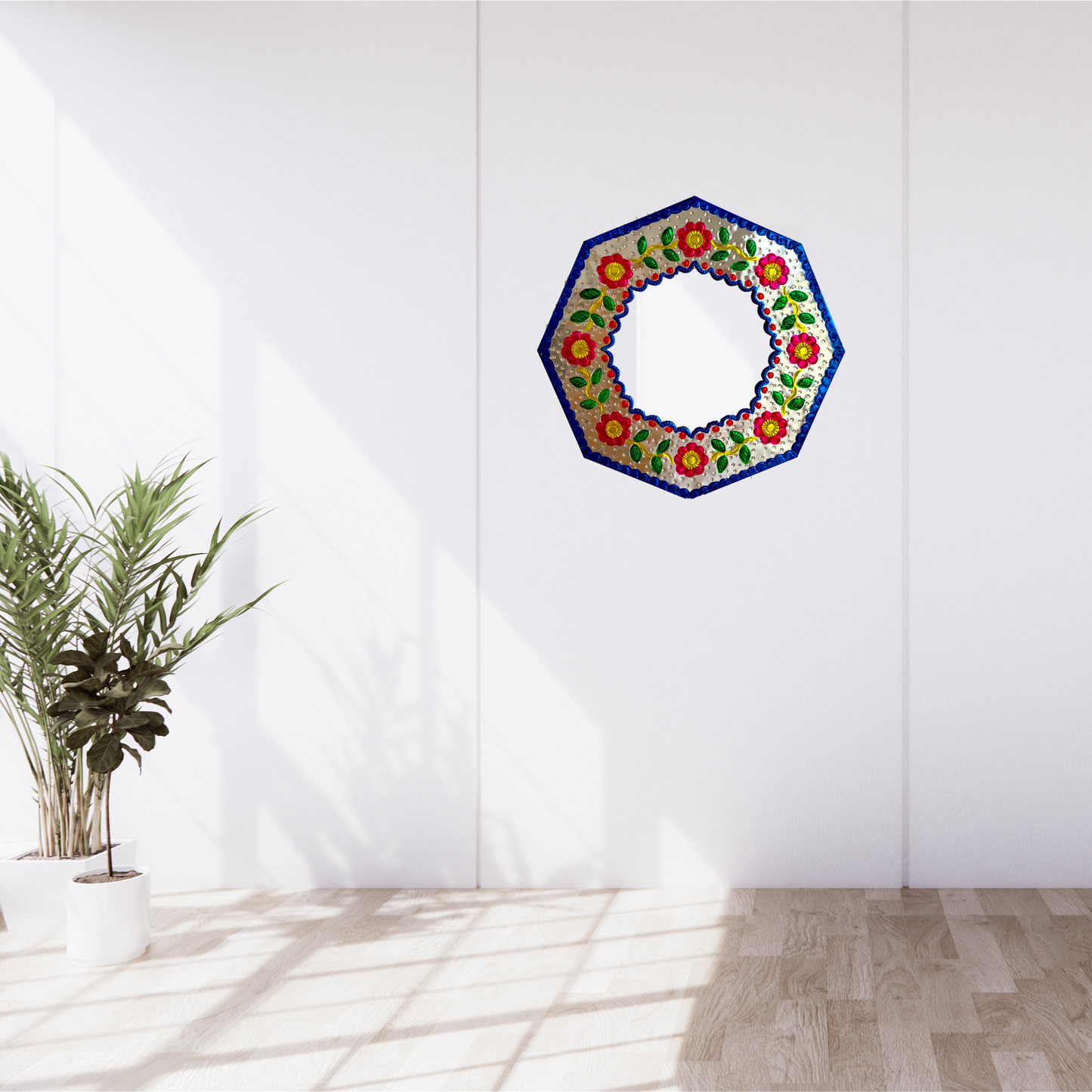 Casa Fiesta Designs' Embossed Tin Mirror - Handcrafted and Hand-painted Mexican Folk Art Wall Decor. on a wall