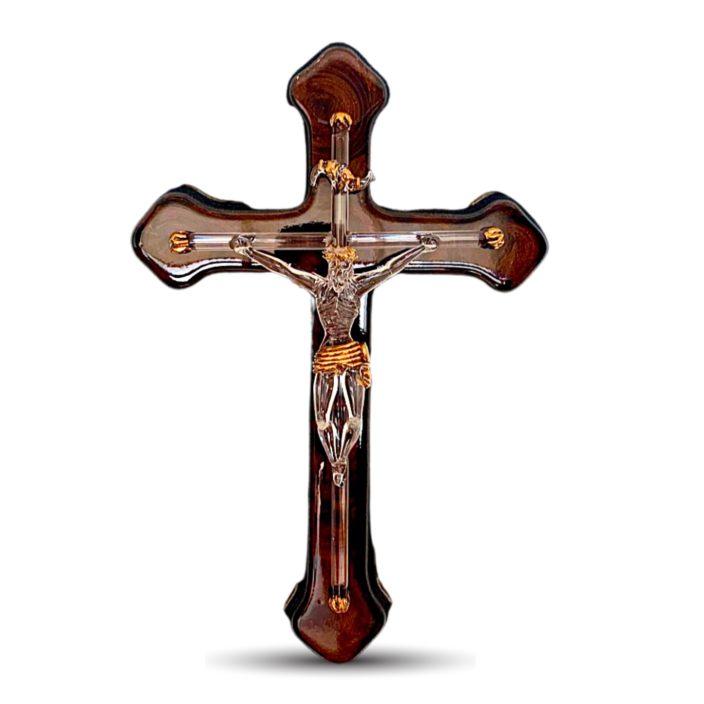 Handmade blown glass sculpture of Jesus on the cross, measuring 7" by 7". Perfect as a unique wall decoration.