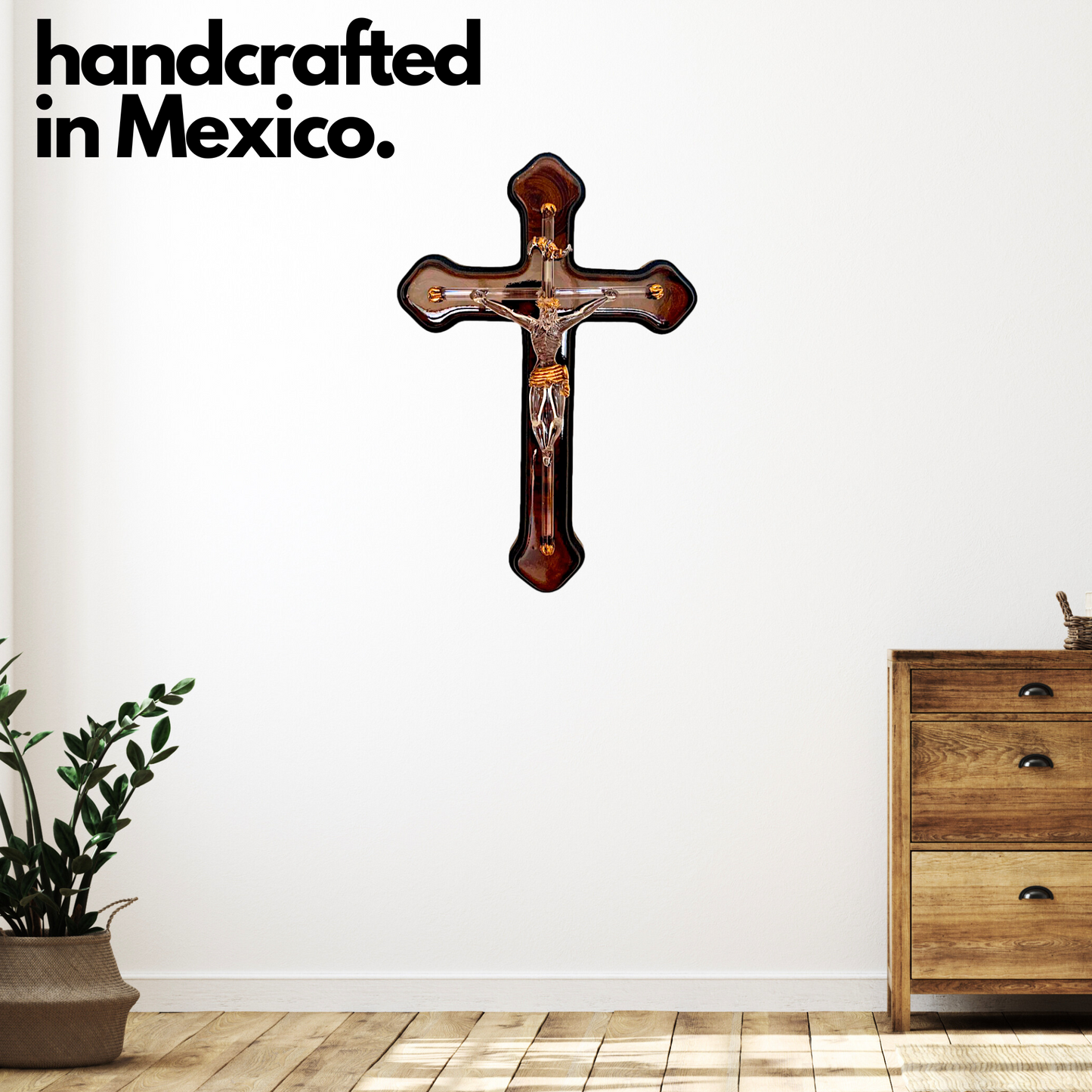 Handmade blown glass sculpture of Jesus on the cross, measuring 7" by 7". Perfect as a unique wall decoration.