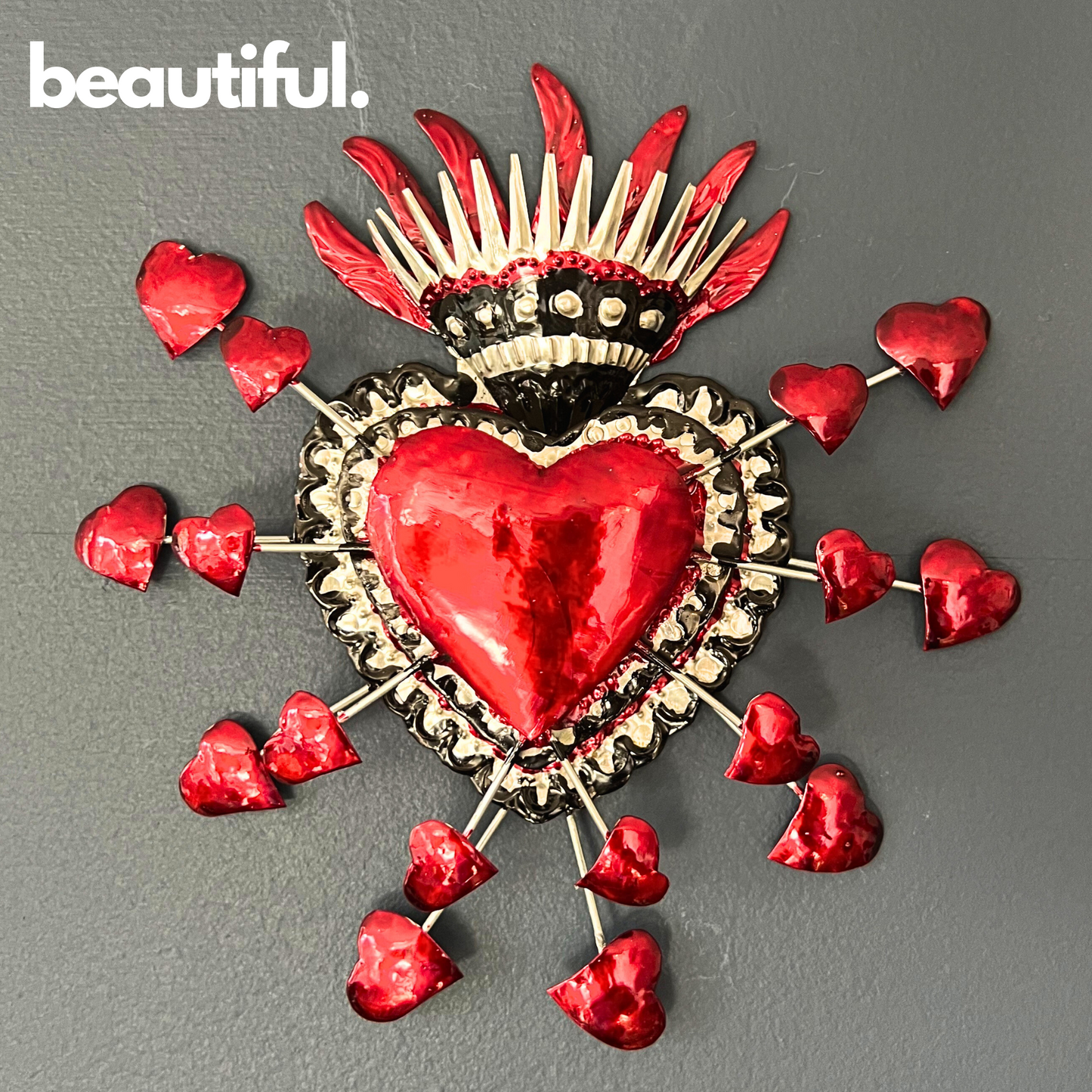 Handmade embossed tin Heart Milagro, painted in vibrant colors, an authentic piece of Mexican folk art, 11.5 inches tall, 10 inches wide.