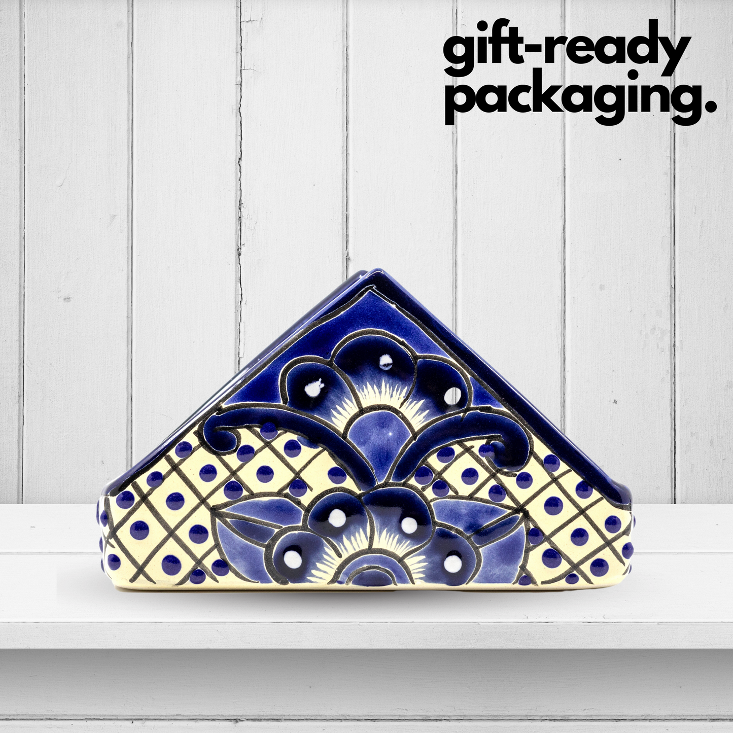 A vibrant, handmade Talavera ceramic napkin holder hand-painted by Mexico's finest artisans, perfect for any kitchen or dining table setting.