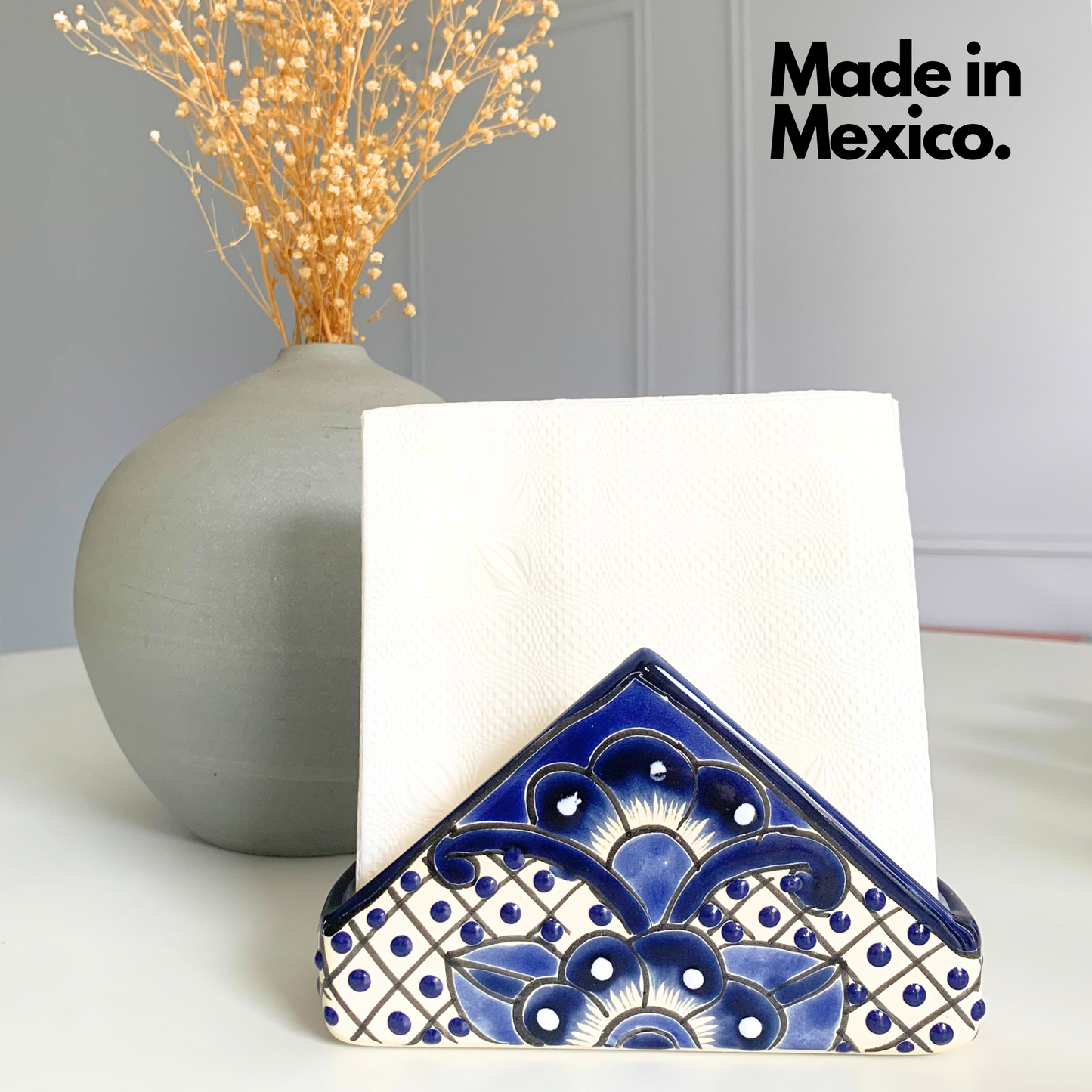 A vibrant, handmade Talavera ceramic napkin holder hand-painted by Mexico's finest artisans, perfect for any kitchen or dining table setting.