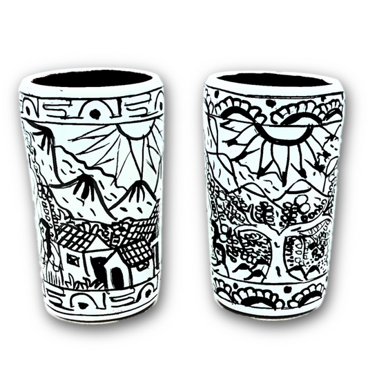 White ceramic shot glasses, individually hand-painted in Mexico, ideal for tequila, mezcal, or other spirits, pack of 2.