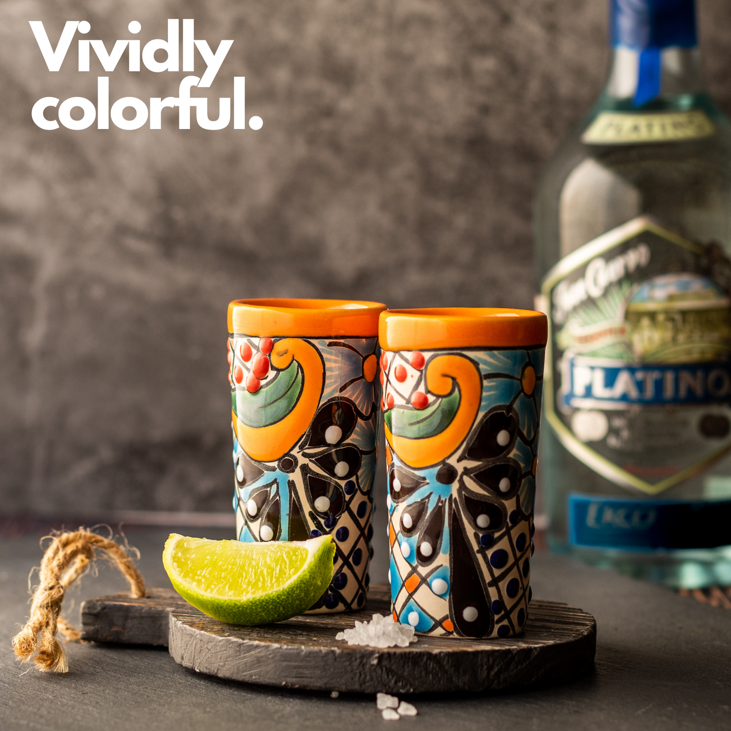 Set of four colorful hand-painted Mexican shot glasses, perfect for tequila or mezcal.