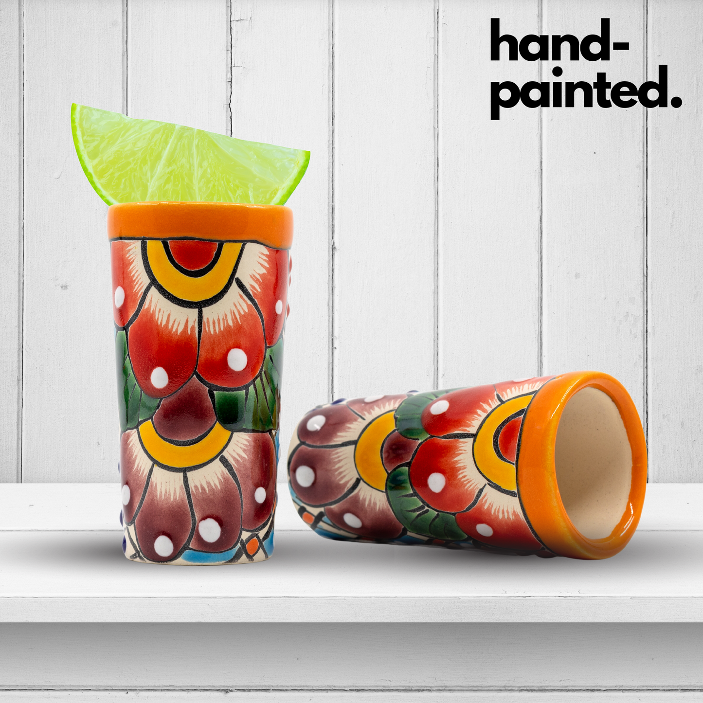 Set of four colorful hand-painted Mexican shot glasses, perfect for tequila or mezcal.