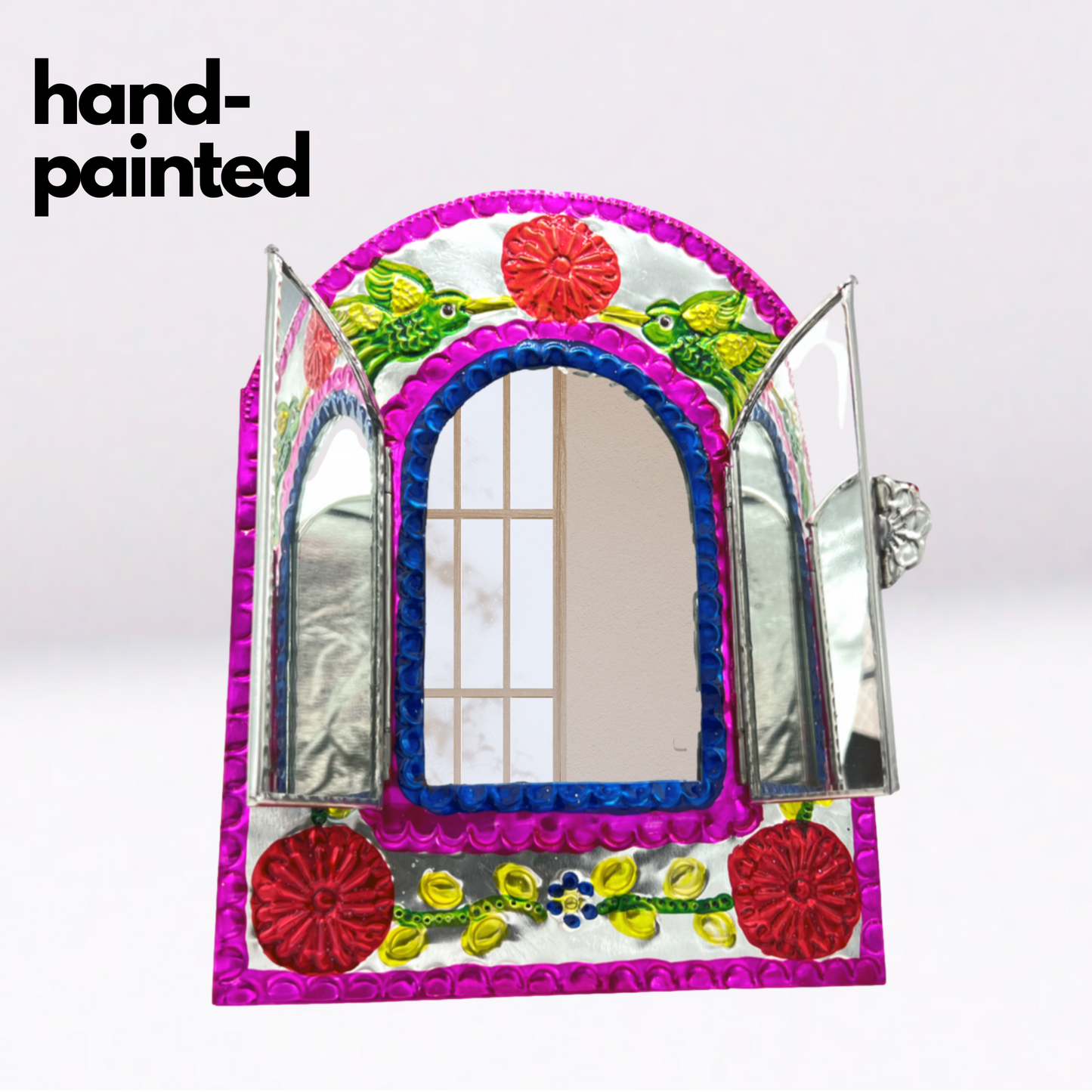 opened door of Handcrafted Embossed Tin Mirror, authentic Mexican folk art, perfect to add elegance and charm to any room.