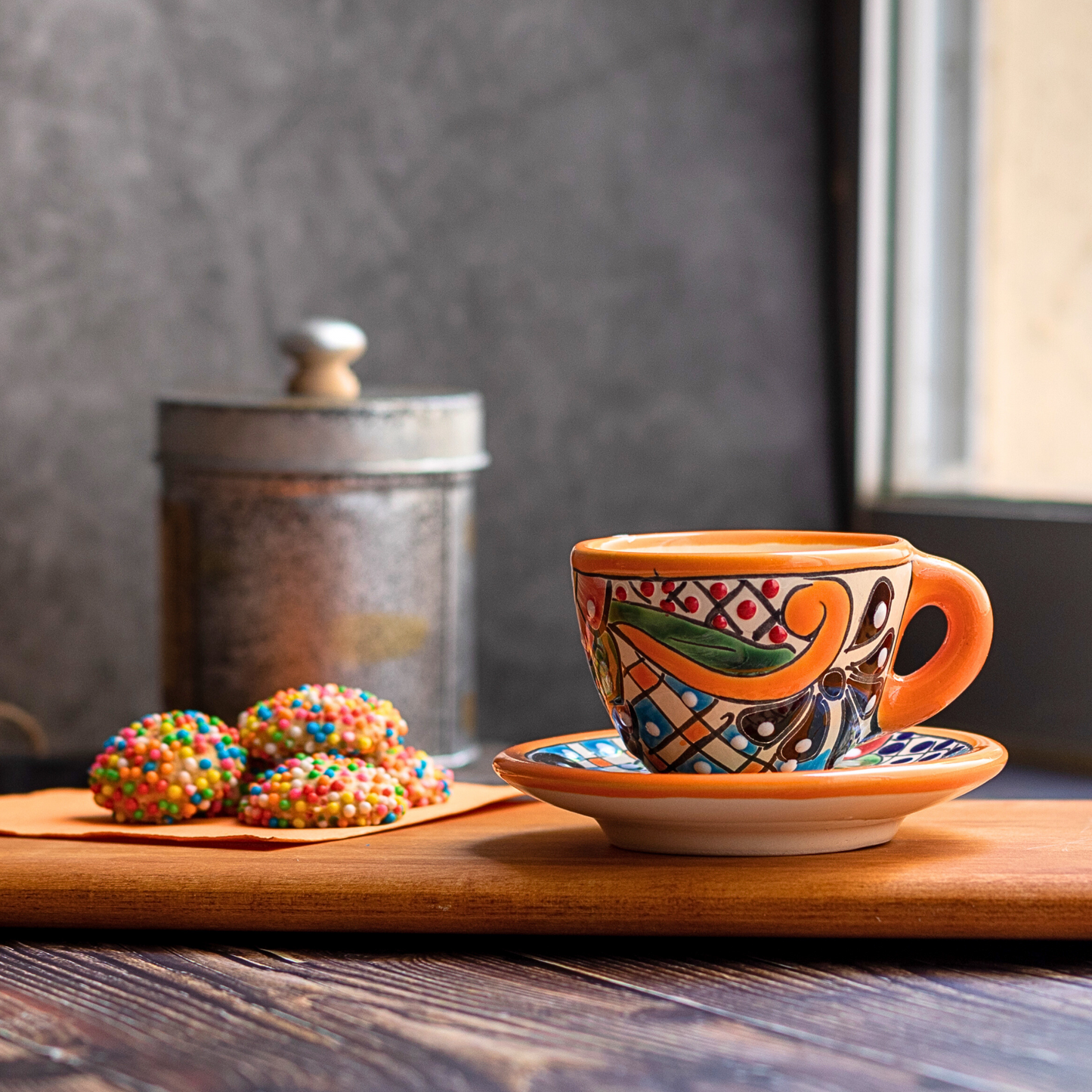 Handmade and hand-painted Mexican Talavera Ceramic Espresso Cup and Saucer set with vibrant floral pattern.