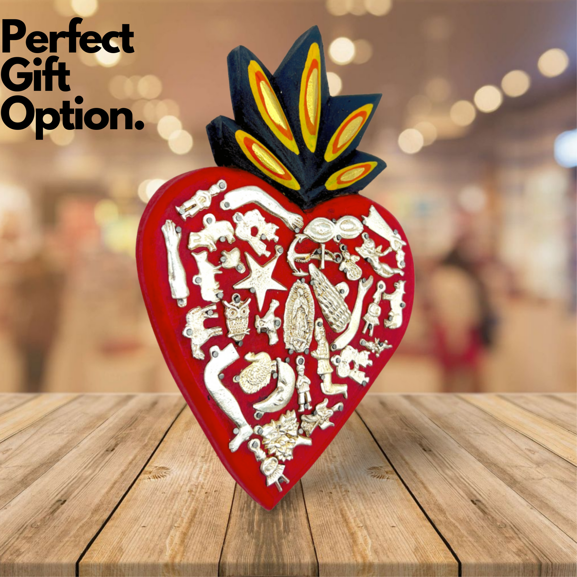 perferct gift option Ex Voto Wooden Sacred Heart, hand-painted by Mexican artisans, featuring colorful milagros, perfect for wall decor and enhancing your space.