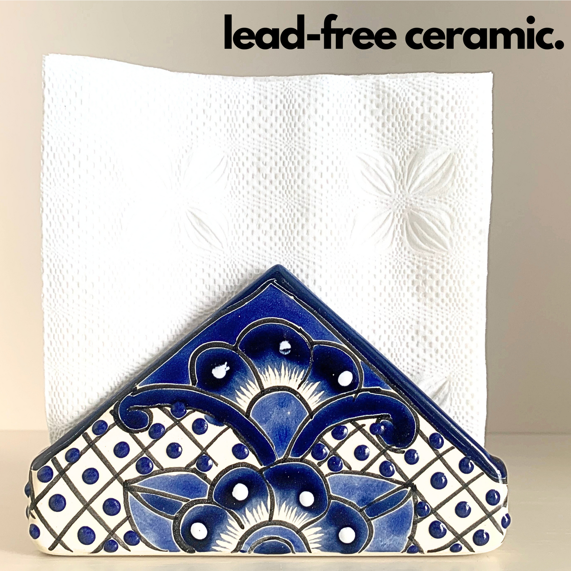 A vibrant, handmade Talavera ceramic napkin holder hand-painted by Mexico's finest artisans, perfect for any kitchen or dining table setting.