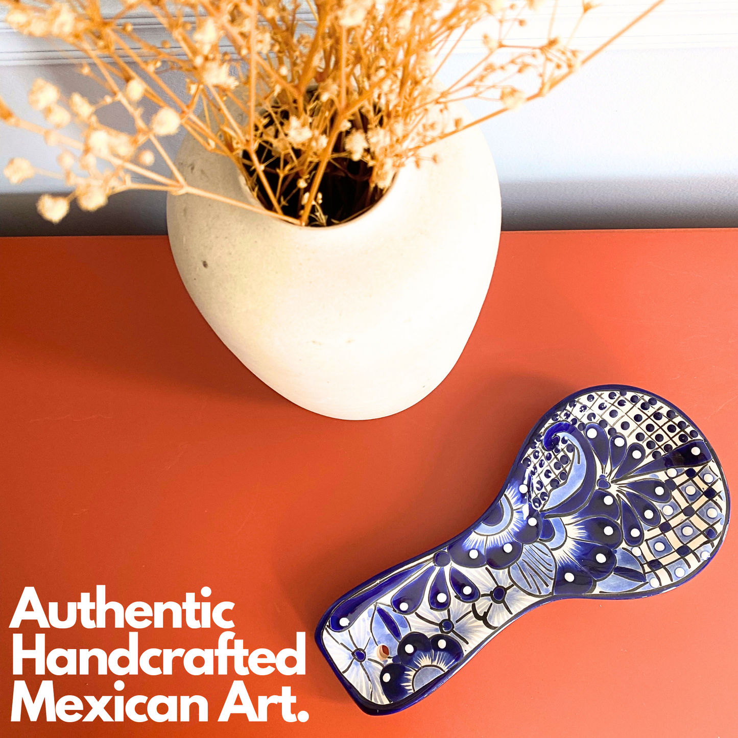 Charming blue & white Mexican handmade spoon rest, featuring handpainted folk art, made in Mexico as a unique porta cucharas spoon holder