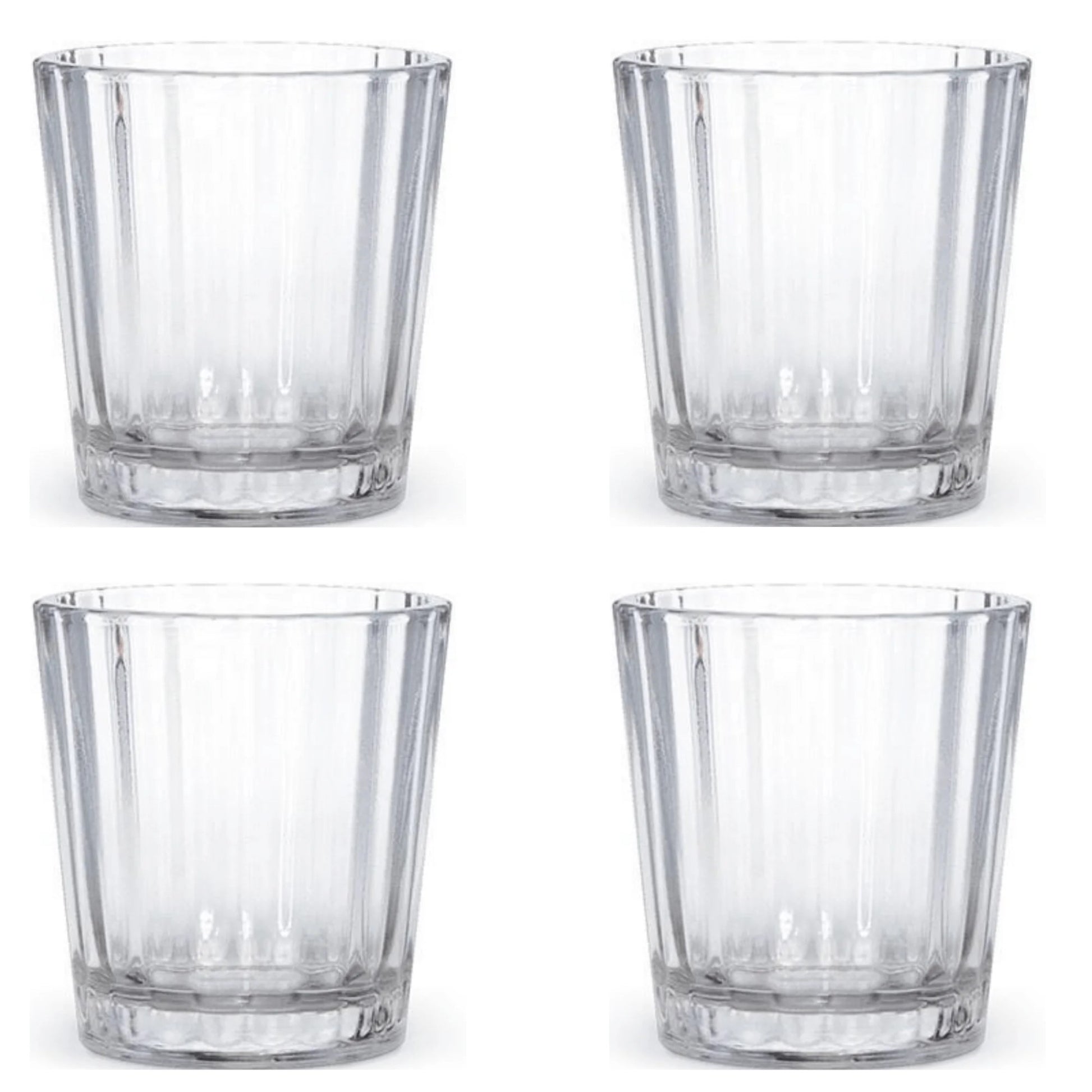 A set of 4 Mexican Vaso Veladoras shot glasses, lead-free, with a unique cross symbol at the base, perfect for serving Mezcal, Tequila, and Sangrita.