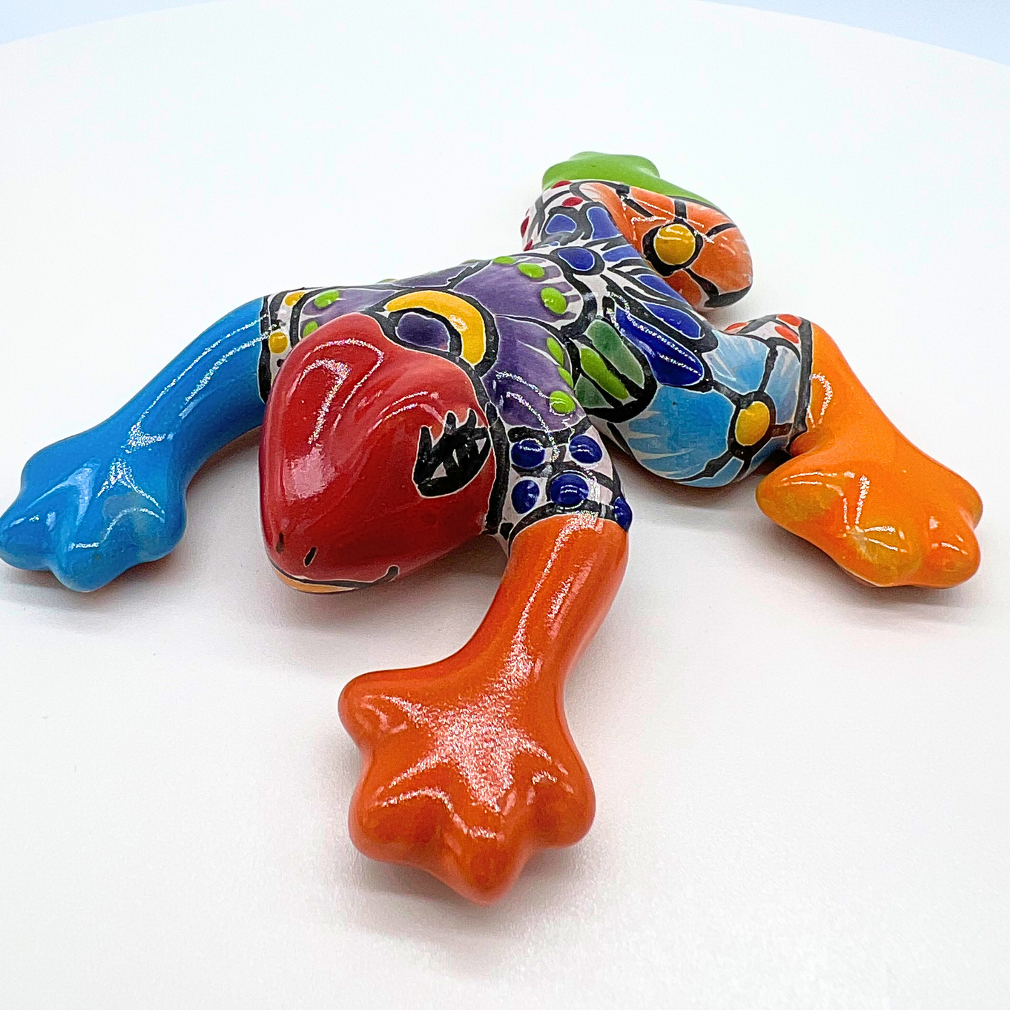 Colorful and hand-painted Talavera Frog, authentic Mexican garden decor, perfect for wall, garden, or table decoration.