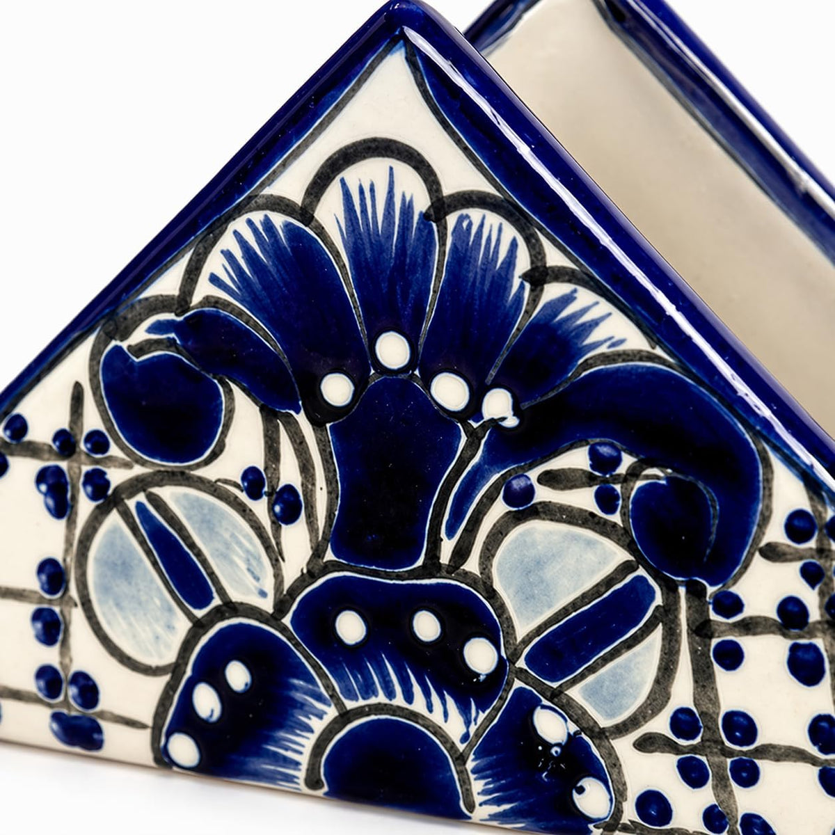 Blue and white Talavera-style ceramic napkin holder, hand-painted in Mexico — detail view