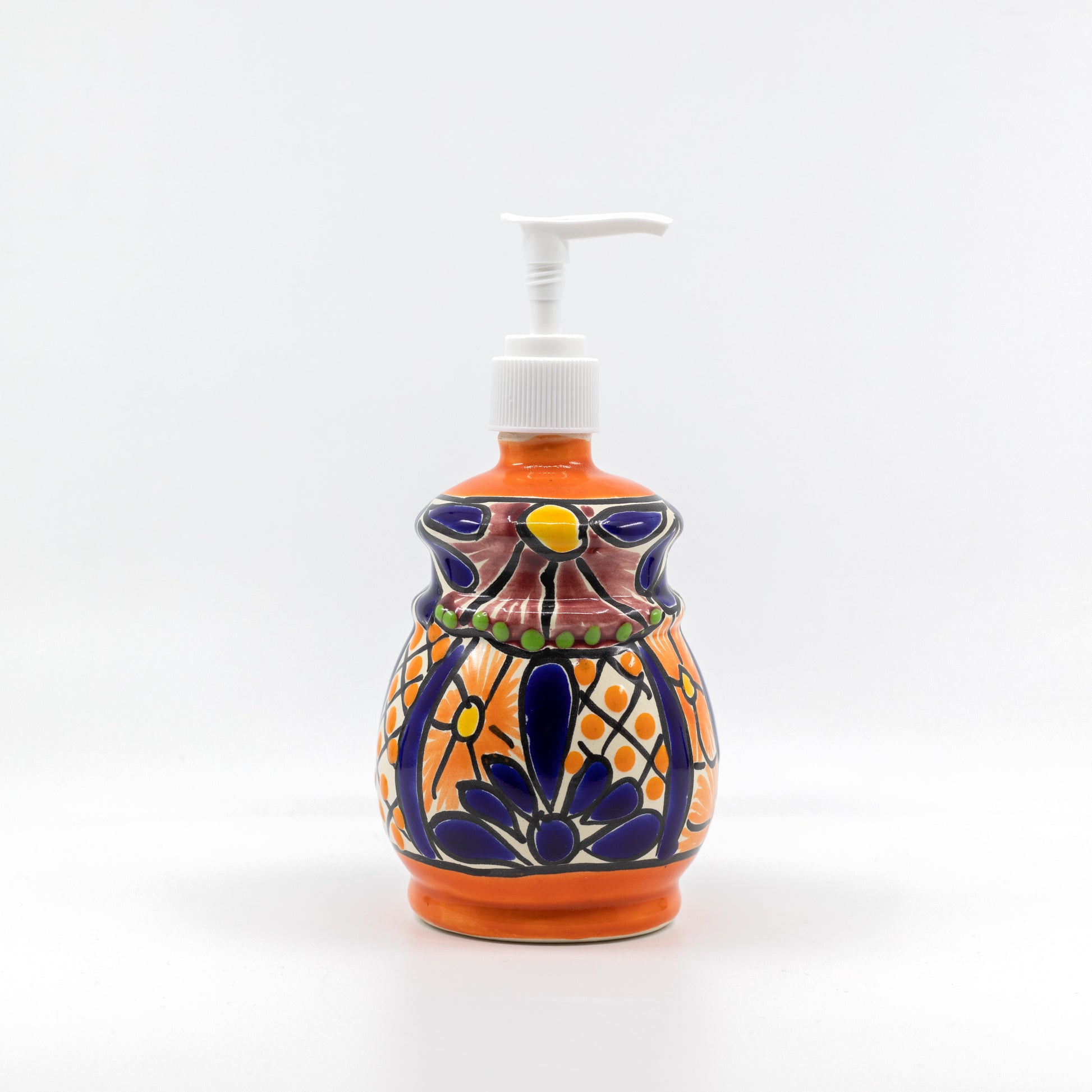 zoom out A multicolored, bell design, hand-painted Talavera ceramic soap dispenser sourced from skilled Mexican artisans.