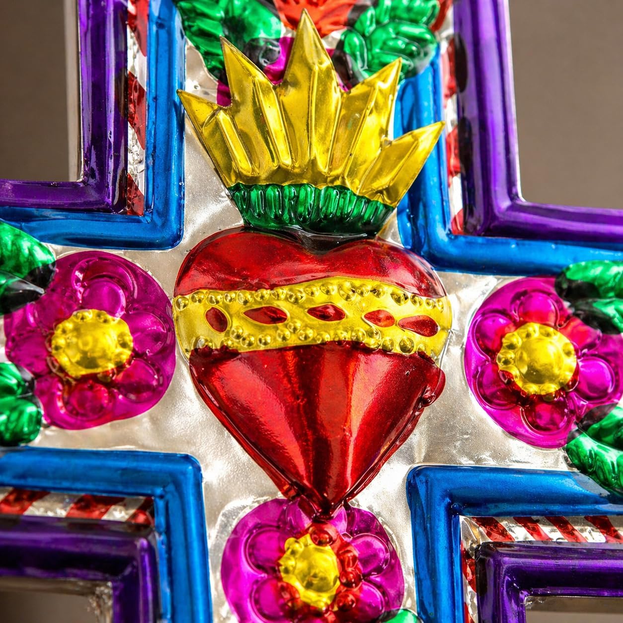 Embossed Tin Cross, Medium — detail of the hand-painted pattern