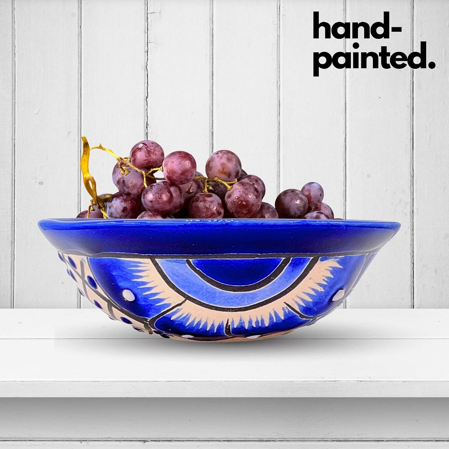 Blue and white Talavera-style ceramic salsa bowl, hand-painted in Mexico — close-up