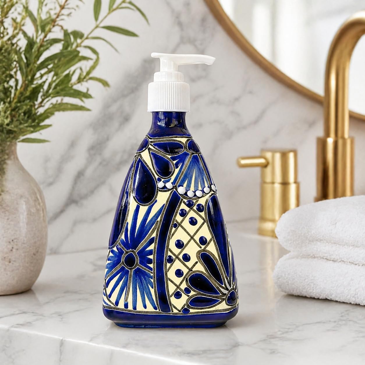 Ceramic Soap and Lotion Dispenser, Blue and White — shown in use
