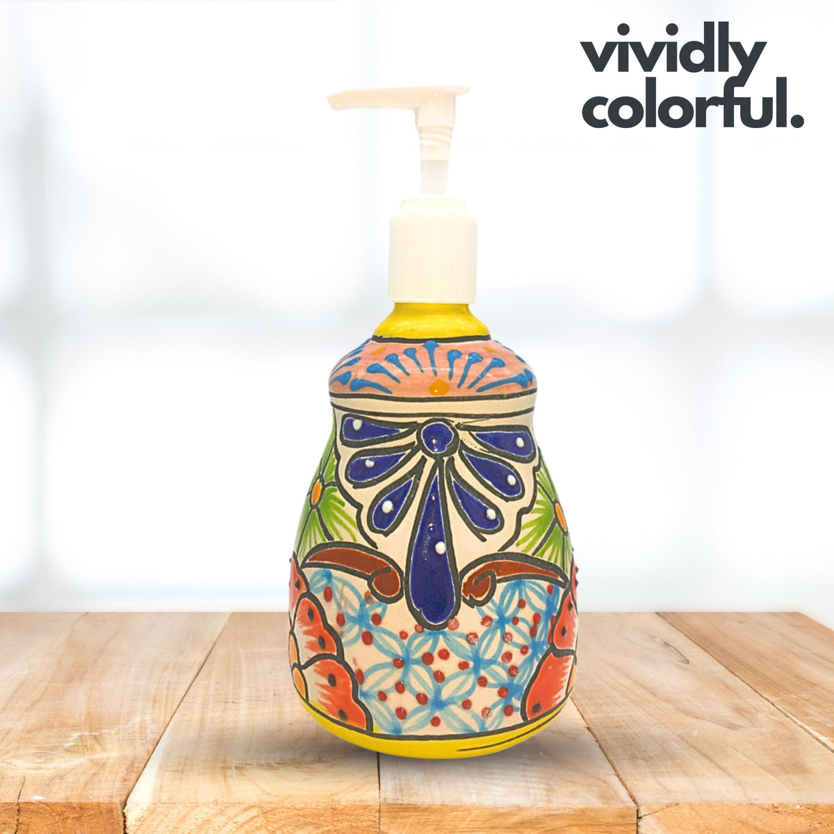 Pastel bell soap dispenser on a wooden counter
