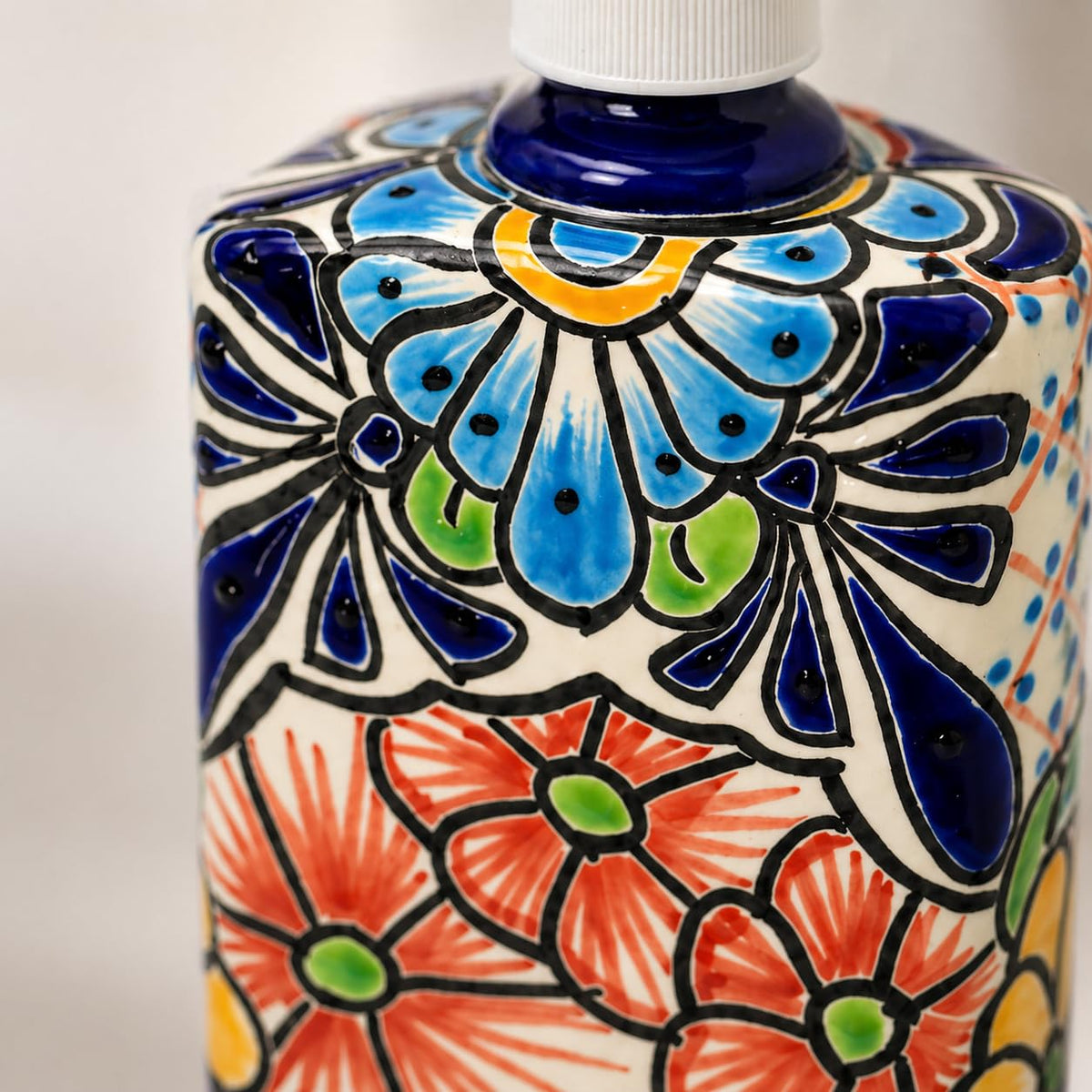 Close-up of the hand-painted coral and blue flowers