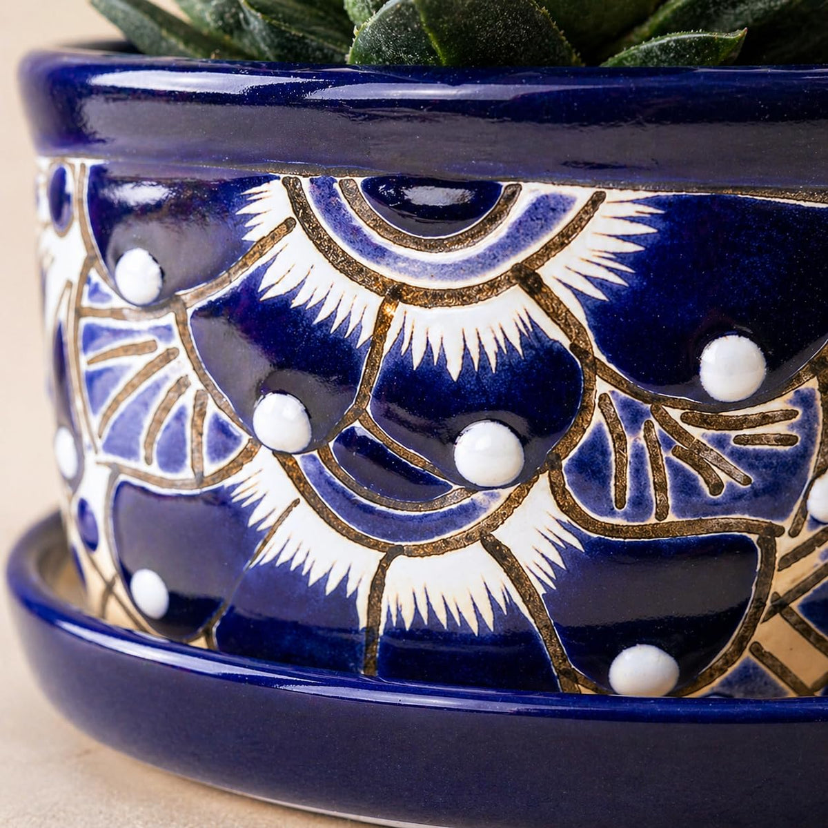 Close-up of the hand-painted cobalt pattern