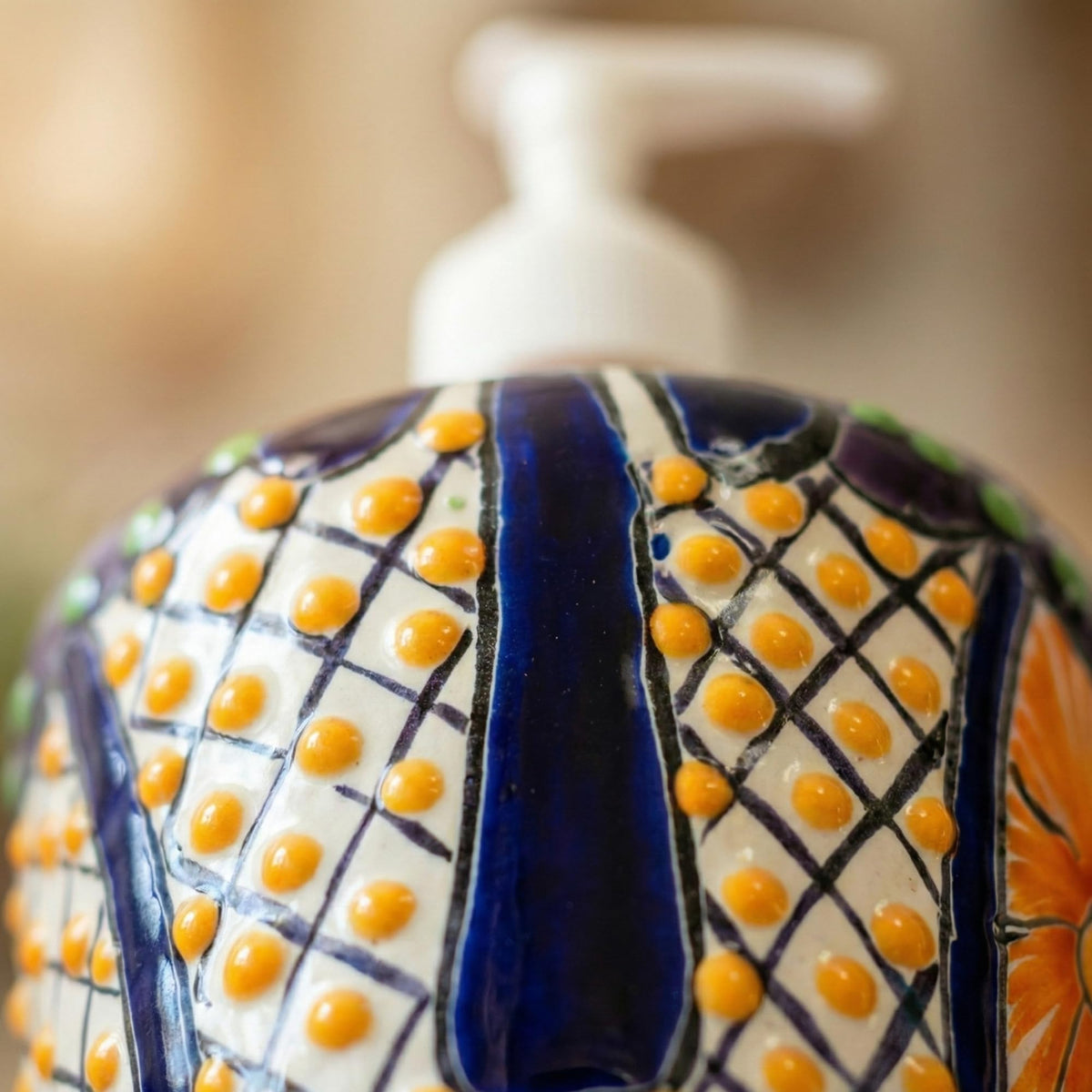 Close-up of the hand-painted lattice pattern
