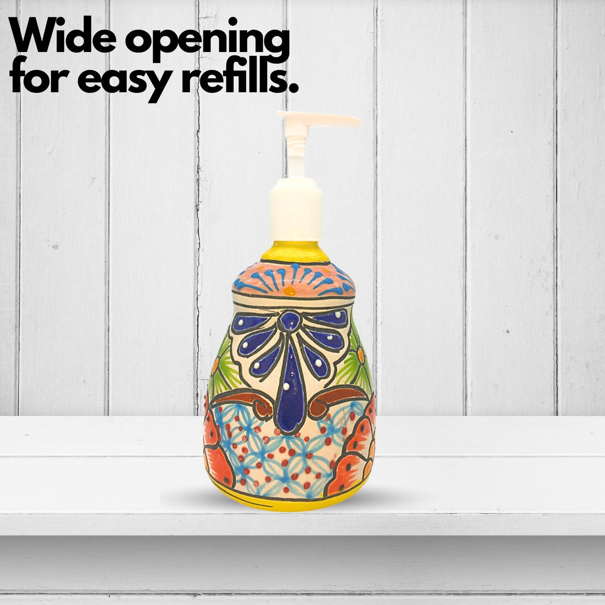 Bell soap dispenser on a white shelf, showing the wide opening