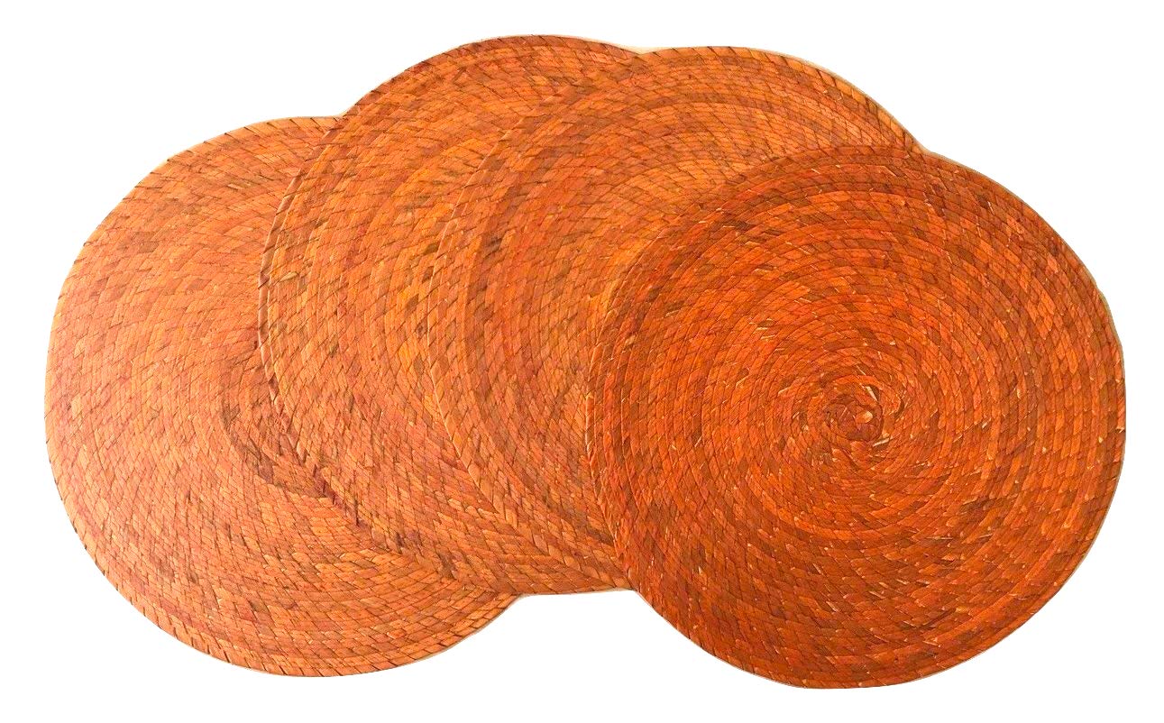 Orange round woven palm placemats set of 4, handmade Mexican table decor — detail of hand-painted pattern