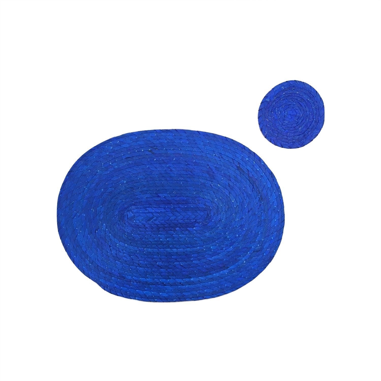 Royal blue woven palm leaf placemats and coasters set of 4, handmade in Mexico — side view