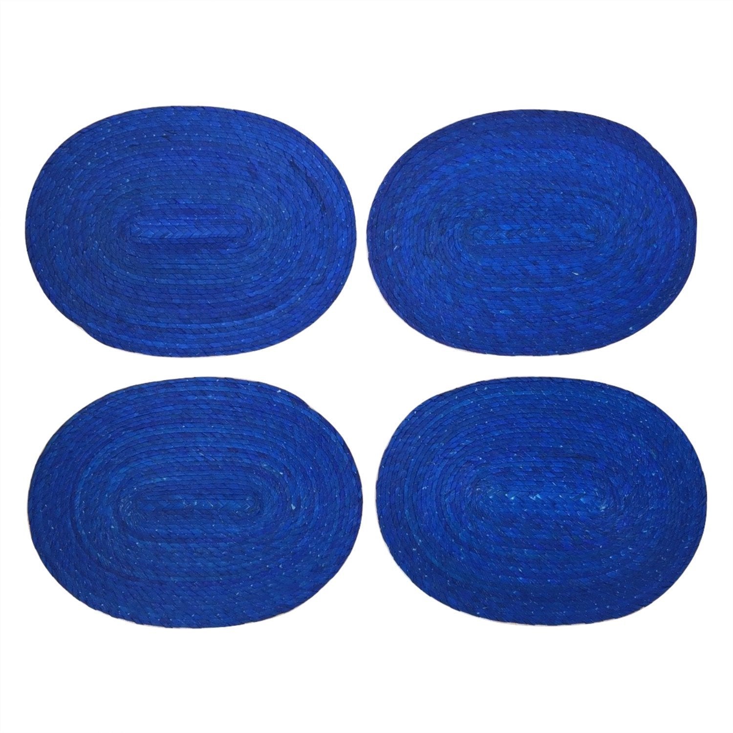 Royal blue woven palm leaf placemats and coasters set of 4, handmade in Mexico — top view