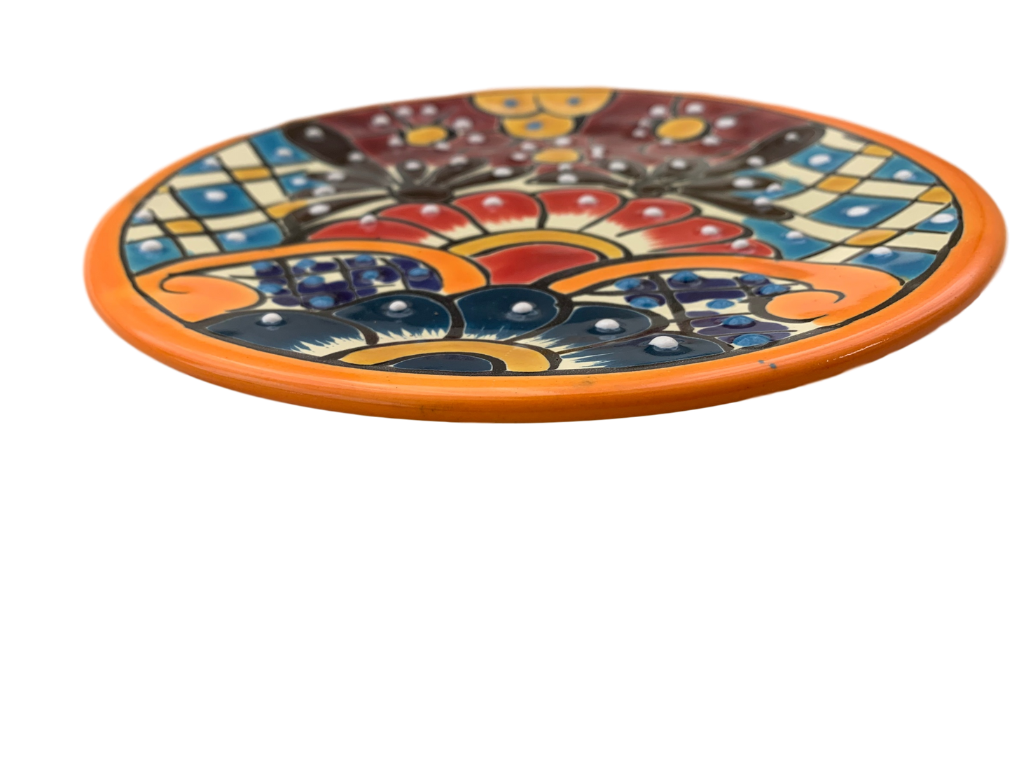 Exquisite Mexican handmade Talavera plate featuring vibrant handpainted Mexican folk art designs, made in Mexico for an authentic and unique dish experience.